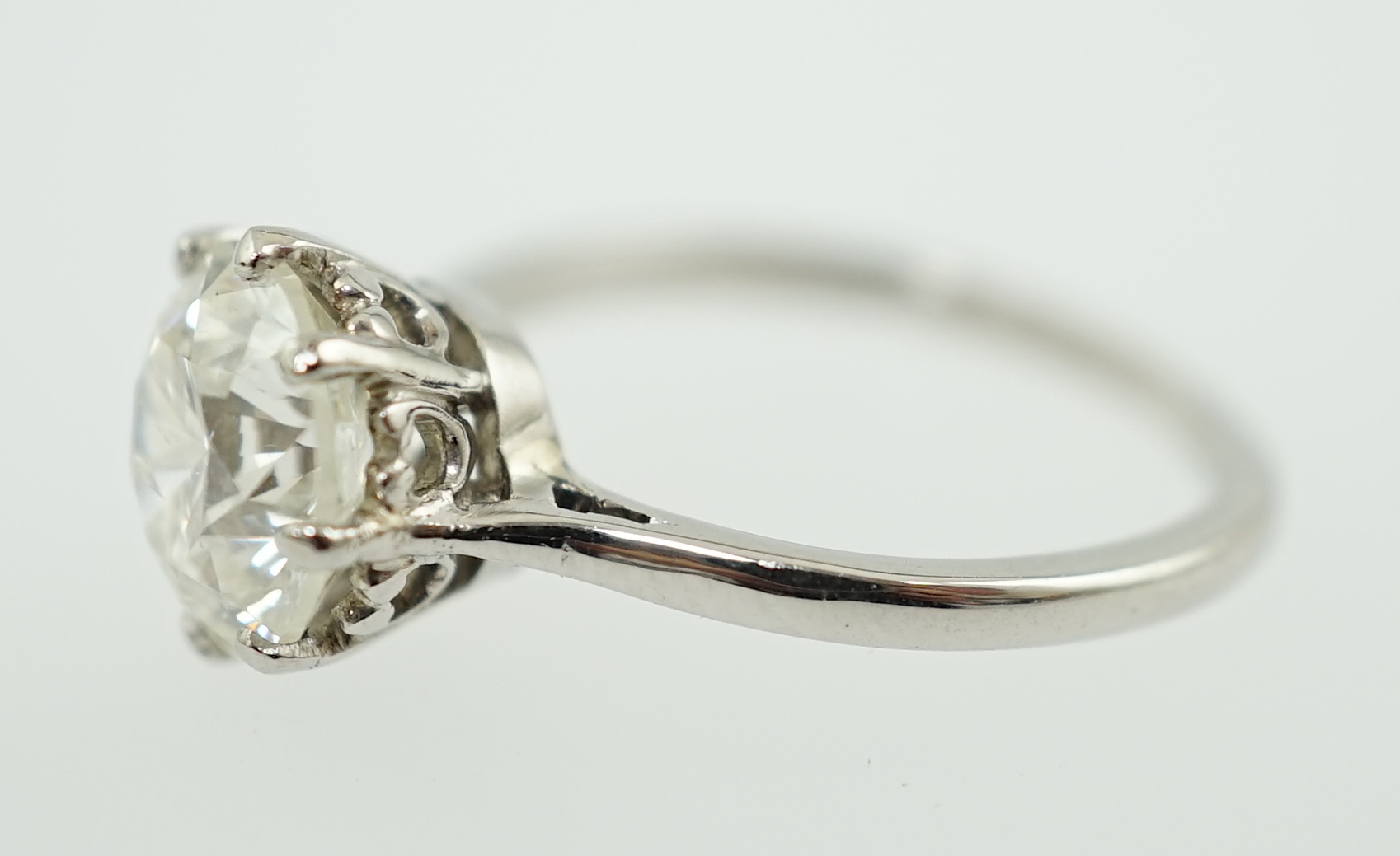 A platinum and solitaire diamond set ring